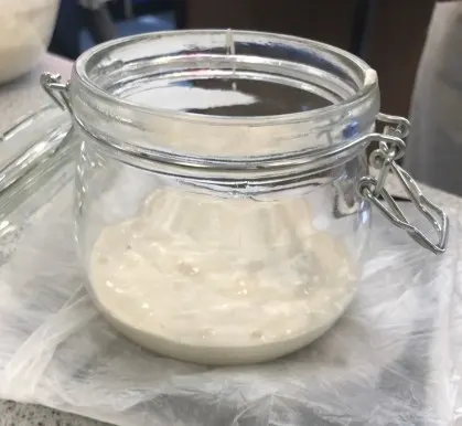 Sourdough starter in a jar.